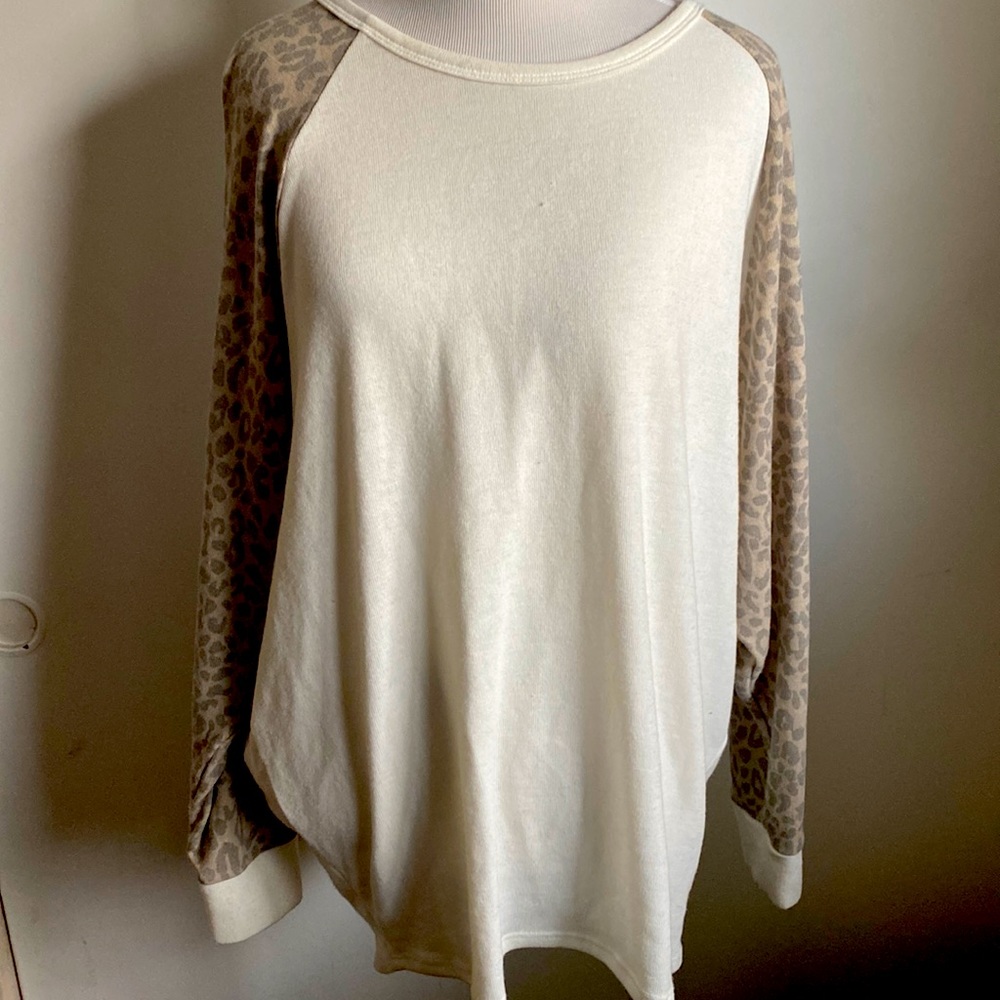 Cream sweater with cheetah sleeves